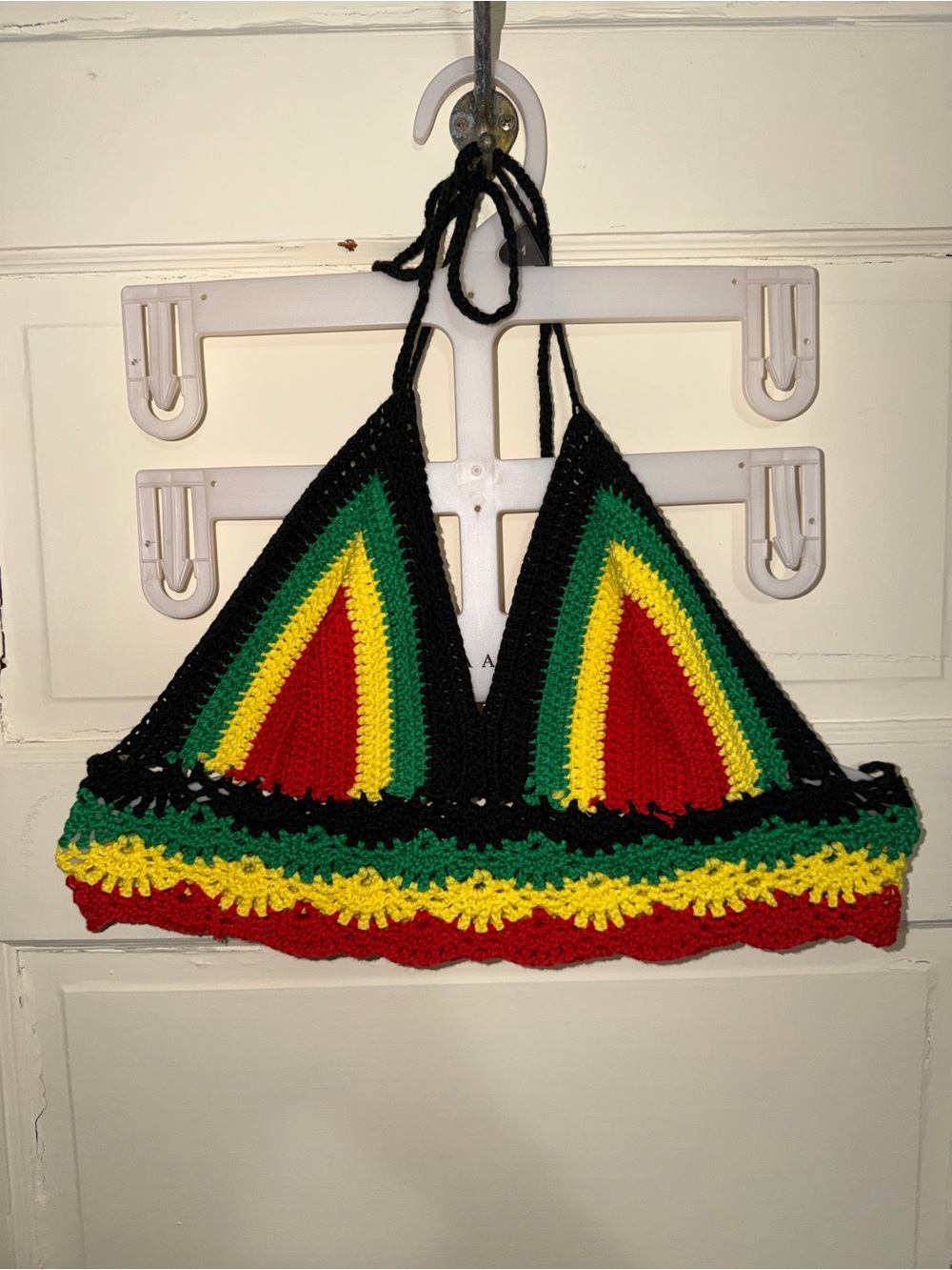 crochet bikini top in red, yellow, and green